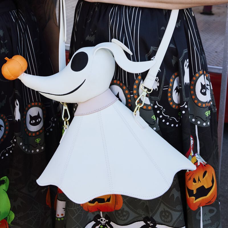 Image of our Stitch Shoppe Zero Figural Glow Crossbody against the Nightmare Before Christmas Stitch Shoppe Sandy Skirt